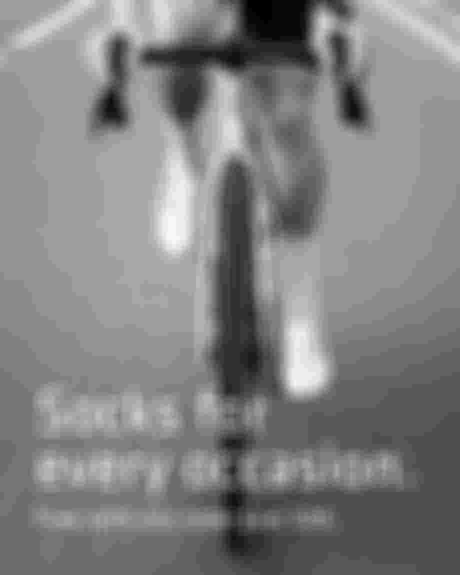 Black and white image of a road cycling person with the text: "Socks for every occasion. Free with any order over 50€."