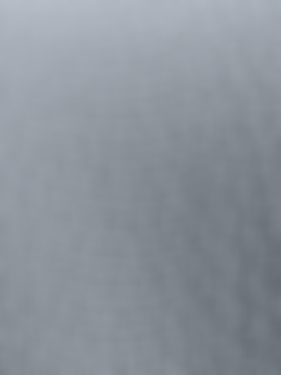 Close-up of a white sock showing its dense, textured knit fabric.