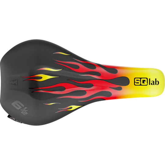 SQlab 6½ ERGOWAVE kids bike saddle in black, red and yellow with flames design