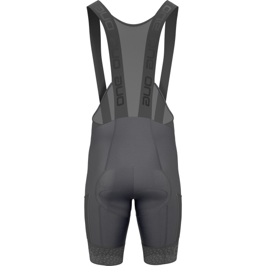 SQlab ONE14 unisex bib shorts in dark charcoal grey – rear view with SQ-Pad 14 chamois and leg pockets for gravel cycling