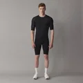 SQlab ONE12 R bib shorts in black for road cycling worn by model showing compression fit and bib straps