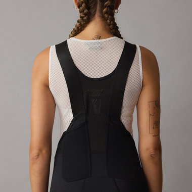 SQlab ONE11 bib shorts in black for mountain biking, back view showing mesh bib straps