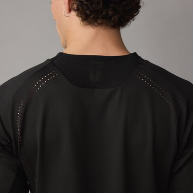 SQlab ONE OX long-sleeve MTB jersey unisex in black, back view with laser ventilation holes