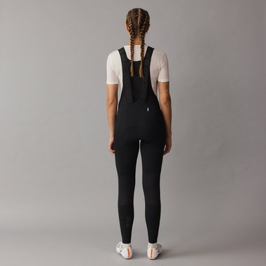 SQlab ONE12 women bib tights in black for cycling, back view on model