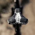 SQlab ClipOn 611 ERGOWAVE active MTB saddle in black and white – front detail view