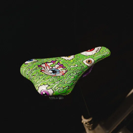 SQlab 6OX ERGOWAVE active 2.2 ltd. Metzger bike saddle in lime green graphic print