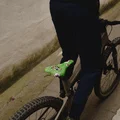 SQlab 6OX ERGOWAVE active 2.2 ltd. Metzger saddle in neon green during mountain biking